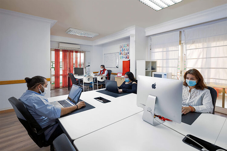 A modern office with a digital marketing team working collaboratively in Cairo, Egypt